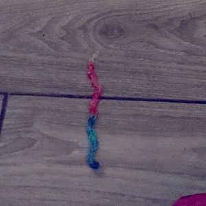 Colors are pink blue and red and handmade